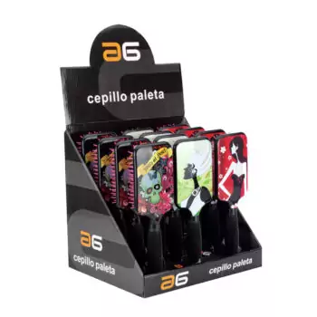 Expositor de mostrador con varios cepillos paleta de mango negro y cerdas rosadas, placas traseras con ilustraciones coloridas y acabado brillante, presentados para uso profesional y con opciones de envío.