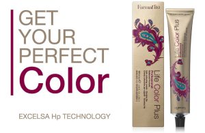 Tubo y caja de tinte profesional para peluquería con diseño dorado y motivos florales.