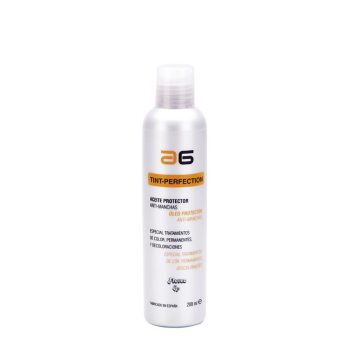 Botella plateada de 200 ml de aceite protector para tratamientos de color con etiqueta Tint-Perfection que indica función anti-manchas y acabado de 'alta calidad'.