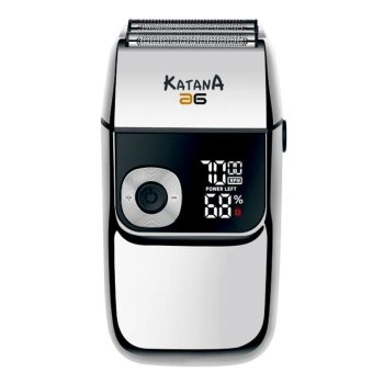 Afeitadora eléctrica de cabezal de láminas en acabado plateado y negro con pantalla digital que muestra porcentaje de batería y control circular, ideal para uso profesional en peluquería.