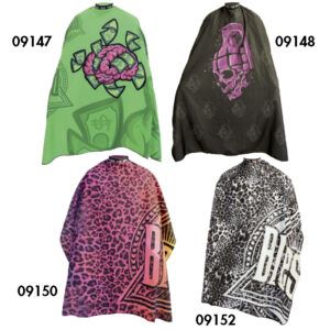 Cuatro capas para corte de cabello con diseños llamativos: una verde con un cerebro rodeado de billetes, una negra con una granada que forma una calavera rosa, una rosa con estampado de leopardo y otra en blanco y negro con patrón animal, para uso en 'peluquería'.