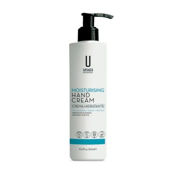Botella blanca con dosificador negro de crema hidratante para manos de 300 ml con etiqueta minimalista en inglés y español que muestra UFAES PROFESSIONAL, apta para peluquería y con aspecto oficial.