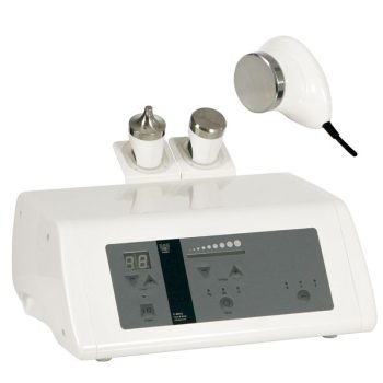 Dispositivo estético profesional blanco con carcasa rectangular y panel frontal gris con pantalla digital y botones, dos aplicadores cilíndricos cromados en la parte superior y una pieza de mano con cabezal circular metálico conectada por cable.