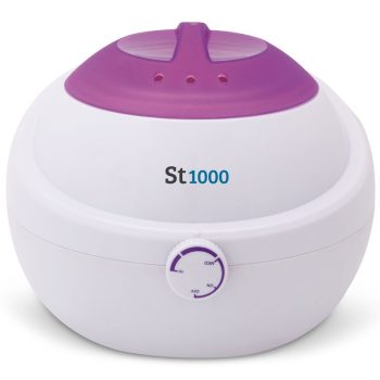 Dispositivo doméstico compacto blanco y morado con tapa superior ventilada y perilla frontal de ajuste en diseño redondeado y acabado liso, apariencia de alta calidad.