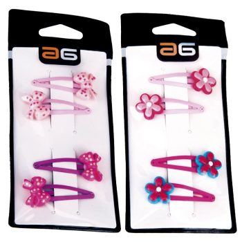 Dos blísters de pasadores para el cabello en tonos rosa y fucsia con adornos de lazos y flores sobre fondo blanco y negro, profesional.