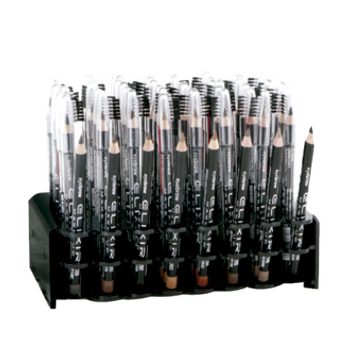 Expositor negro con múltiples lápices en tonos marrones y negros, cada uno con capuchón transparente y brocha tipo spoolie, ordenados en filas sobre una base de plástico para peluquería.