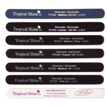 Varias limas de uñas de diferentes colores y texturas con la marca Tropical Shine dispuestas en filas, mostradas en alta resolución y pensadas para uso en peluquería y manicura.