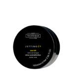 Envase negro circular de 100 ml de cera water wax Jetting Up de la marca Technique, formulada para brillo y definición del cabello e ideal para peluquería.