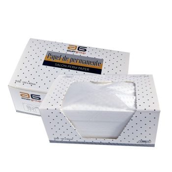 Caja blanca con diseño de puntos que contiene papel de permanente de salón, una unidad abierta mostrando hojas apiladas para uso profesional.
