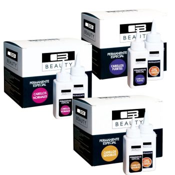 Kits de permanente especial Beauty con tres cajas blancas y negras y botellas dosificadoras etiquetadas para cabellos normales, fuertes y sensibles junto a neutralizante, presentados como producto para peluquería.