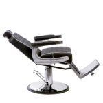 Sillón de barbería premium en cuero negro con reposapiés cromado