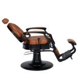 Sillón de barbero exclusivo del cuero marrón vintage