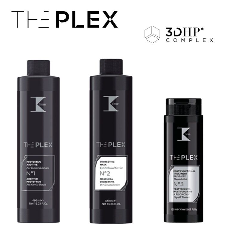 Tres elegantes envases negros de productos capilares con diseño minimalista y etiquetas blancas, dos de mayor altura y uno más corto, con logotipos y texto que sugieren tratamiento y protección del cabello, acabado premium y uso profesional.