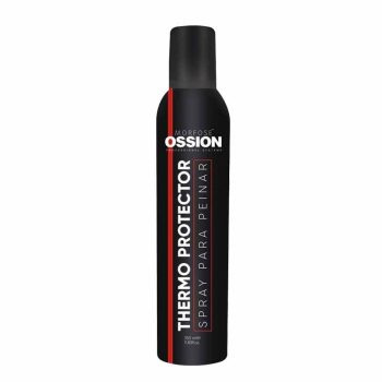 Envase aerosol negro con detalles rojos y texto blanco que indica Thermo Protector y spray para peinar, diseñado como producto cosmético para peluquería.