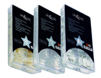 Tres cajas de plástico transparentes con compartimentos llenos de tips para uñas en tonos natural, transparente y ultrablanca, con etiquetas negras y un icono de estrella.