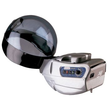 Secador de casco de salón plateado con capucha translúcida oscura y panel de control con botones y dial, diseñado para uso profesional.