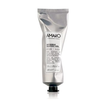 Tubo plateado brillante de gel de afeitado invisible con etiqueta frontal y tapa negra, presentado sobre fondo blanco para uso profesional.