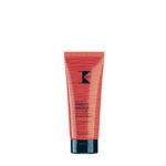 Envase en tubo rojo anaranjado con diseño de rayas y tapa negra sobre fondo blanco que contiene gel para peinar de aspecto profesional y calidad visible.
