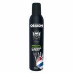 Lata negra de spray limpiador para materiales metálicos con diseño barbería que muestra un logo de calavera, tijeras y navaja y una franja tricolor, pensada para uso profesional de alta calidad y formulación en alta concentración.